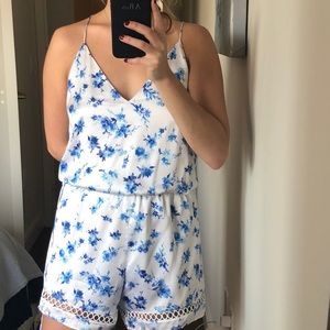 White with blue flower romper